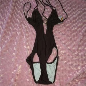 One piece swim suit / bathing suit. Fits 4-6